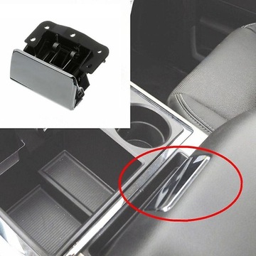 DRŽÁK DO KRYTU OPĚRADLA KONZOLA STŘEDNÍ RAM 1500 2500 2013-2017