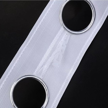 ЛЕНТА ЖЕСТКАЯ С ЛЮСНЯМИ для штор шириной 8см.