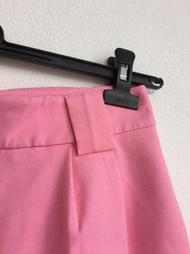 Reserved, różowe spodnie w kantkę, r M