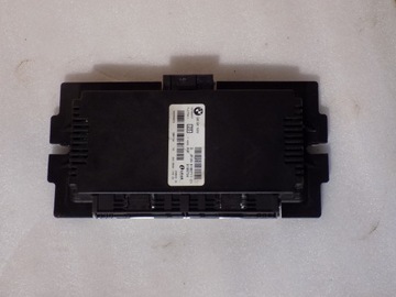 BMW E87 E90 E91 MODUŁ STEROWNIK ŚWIATEŁ 9166711 9166734