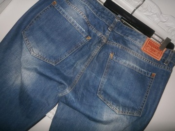 Dsquared2 spodnie dżinsowe z dziurami 54