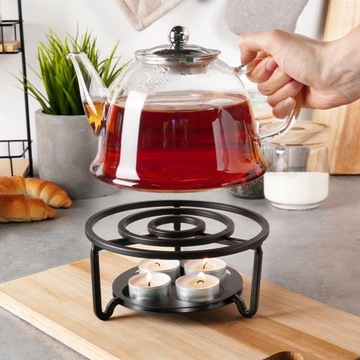 Черный подогреватель для кастрюль с 4 свечами.