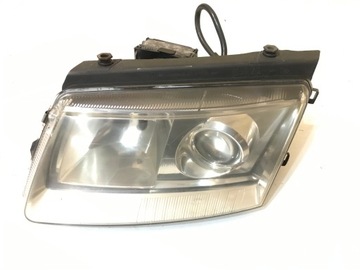 VW PASSAT B5 XENON 97-00R LAMPA LEWA LEWY PRZÓD HELLA