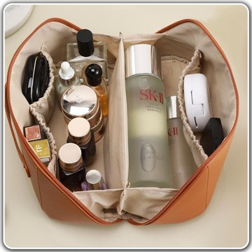 ЖЕНСКАЯ КОЖАНАЯ ДОРОЖНАЯ СУМКА ДЛЯ КОСМЕТИКИ.