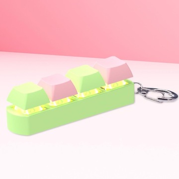 Непоседа-клавиатура Сенсорная игрушка Креативная игрушка с механическими клавишами зеленого и розового цвета