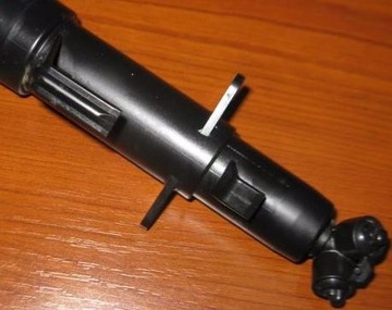 SPRYSKIWACZ LAMPY LEWY RENAULT MAGNUM