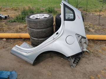 KIA VENGA BLOTNIK LEWY TYL POSZYCIE 2R