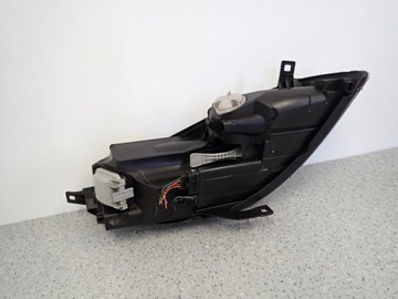 MITSUBISHI COLT 03-08 SVĚTLOMET LEVÝ SVĚTLO PŘEDNÍ TMAVÁ