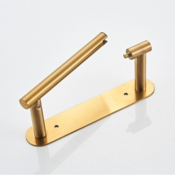 Держатель для рулонов туалетной бумаги. Современная массивная подставка для хранения из матового золота.