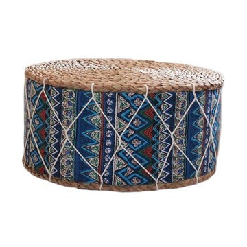 on a stool with a handmade cushion for