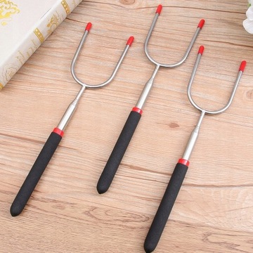 Телескопическая вилка для гриля.