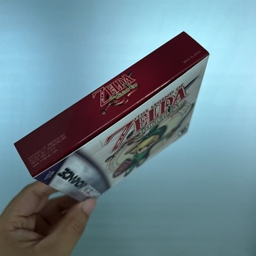 Кепка миниша Legend of Zelda GBA включает в себя коробки.
