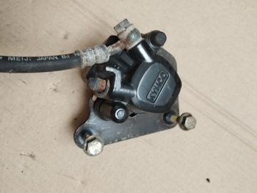 Kymco super 8 zacisk hamulca przód
