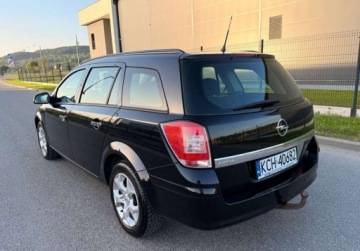 Opel Astra J Sports Tourer 1.6 Twinport ECOTEC 115KM 2010 Opel Astra LIFT 1.6i 115ps PDC GrzaneFotele Klima Doinwestowana Bezwypadko, zdjęcie 5