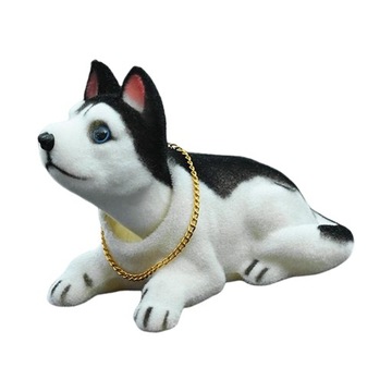 Śliczne psy z kiwającą głową, kiwający pies, poruszający głową, szczeniak dla samochodu Husky