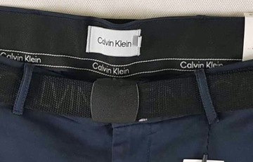 Calvin Klein -K10K109591-meskie spodenki z paskiem oryginalne granatowe W42