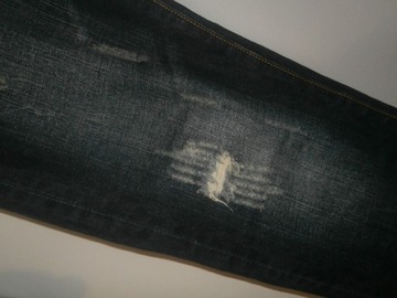Dsquared2 spodnie dżinsowe tarcia dziury logo 31