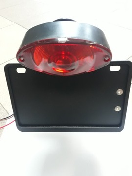 Боковой держатель номерного знака мотоцикла