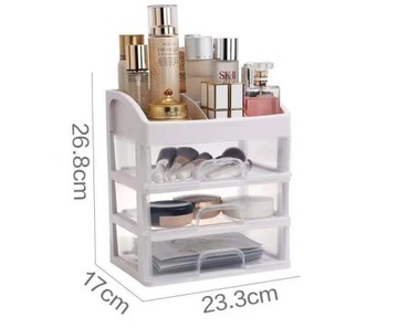 Пластиковый косметический шкаф с выдвижными ящиками и полкой.