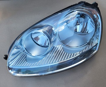 LAMPA PRZEDNIA LEWA SILNICZEK VW JETTA GOLF V 5 OE HELLA 1K6941005Q