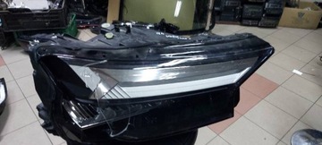 80A941034 audi Q5 reflektor prawy uszkodzony