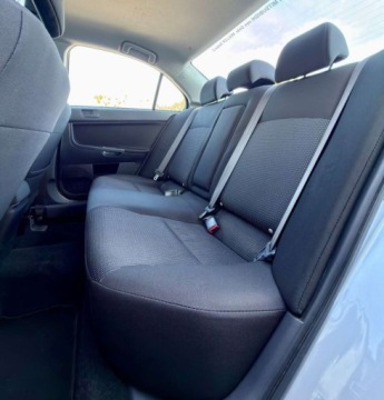 Mitsubishi Lancer IX Sedan 1.5 MIVEC 109KM 2010 Mitsubishi Lancer UDOKUMENTOWANY PRZEBIEG 1 wlasciciel BEZWYPADKOWY klimat, zdjęcie 16