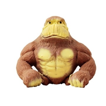 Goryl ściska lalkę wydechową, aby złagodzić stresStatuetka goryla