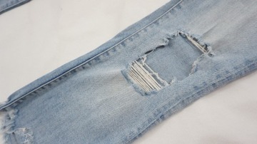 ZARA spodnie jeansy z dziurami haft r 32 k2