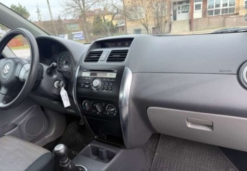 Suzuki SX4 I Hatchback 1.6 i 16V VVT 107KM 2009 Suzuki SX4 Suzuki SX4 1.6 VVT 4x4 Club 1.6 Benzyna 107KM, zdjęcie 16