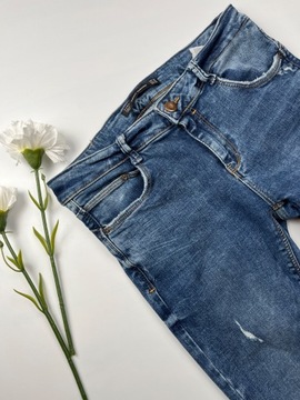 Klasyczne jeansy damskie rurki z przetarciami spodnie jeansowe ZARA r. XXS