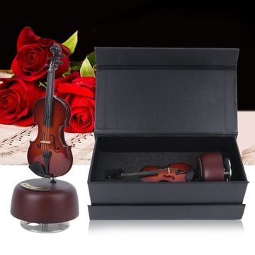 Скрипка в форме вращающейся деревянной музыкальной шкатулки.