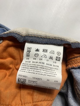HUGO BOSS Orange 31 PRIVATE oryginalne Spodnie Jeansy W 34 L 32