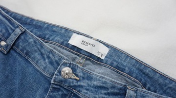 RESERVED spodnie jeansy z przetarciami r 44