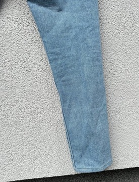 Levis 711 Skinny W31 niebieskie jasne baby blue spodnie jeansowe damskie