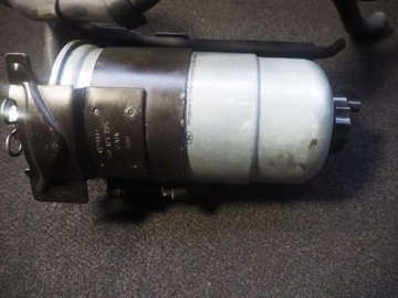 UCHWYT OBUDOWA FILTRA PALIWA GOLF IV 1M0127225