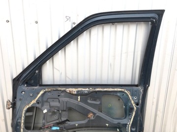 DVEŘE PRAVÝ PŘEDNÍ FORD MAVERICK 93-98