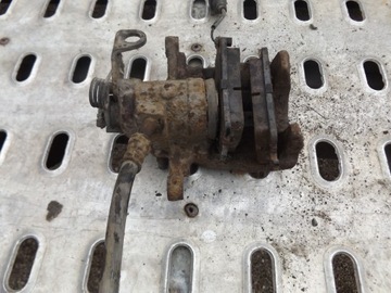 VW T5 T6 ZACISK HAMULCOWY TYLNY TYŁ LEWY PRAWY