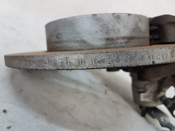 ZACISK HAMULCOWY LEWY PRAWY TYŁ TYLNY VW TOURAN I