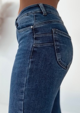 Jeansy spodnie damskie modelujące push up M Sara XL/42 31/32 rozmiary