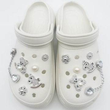Przypinki do butów crocs 12 SZTUK CHARMS SREBRNE CYRKONIE PINY GLAMOUR