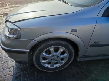 BŁOTNIK PRZEDNI LEWY OPEL ASTRA II G Z157