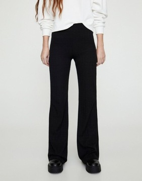 Damskie prążkowane spodnie rozszerzane w kolorze czarnym defekt L