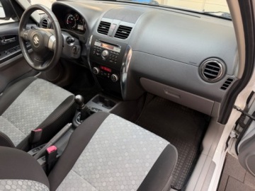Suzuki SX4 I Hatchback Facelifting 1.6 VVT 120KM 2013 Suzuki SX4 4x4 biala perla bezwypadkowy bogato wyposazony 2013 2x alu oryg, zdjęcie 38
