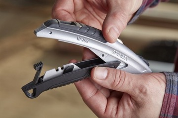 Нож с выдвижным трапециевидным лезвием STANLEY DYNAGRIP 180мм 0-10-788