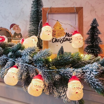 Рождественские гирлянды с красивым Санта-Клаусом