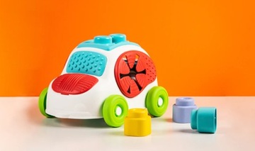 Сенсорная машинка Clemmy, место для хранения кубиков Clement.