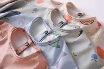 Слиб в динозаврах с карманным фартуком для мальчика в детском саду, s