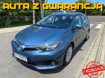Toyota Auris II Touring Sports Facelifting 1.8 Hybrid 136KM 2016 Toyota Auris HYBRYDA AUTOMAT KLIMATYZACJA NAWIGACJA KAMERA TEMPOMAT GRZANE