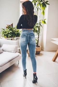 Jeansowe spodnie damskie rurki wycięcie stan S