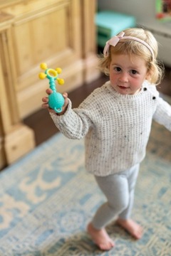 Прорезыватель Gumlii с погремушкой